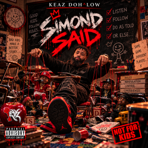 Keaz Doh^Low controlling miniature rapper puppets in a dark classroom on the Simond Said single cover